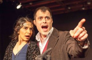 Photo of two actors performing in the play Hotel Crimson as part as the Performance group December 2017